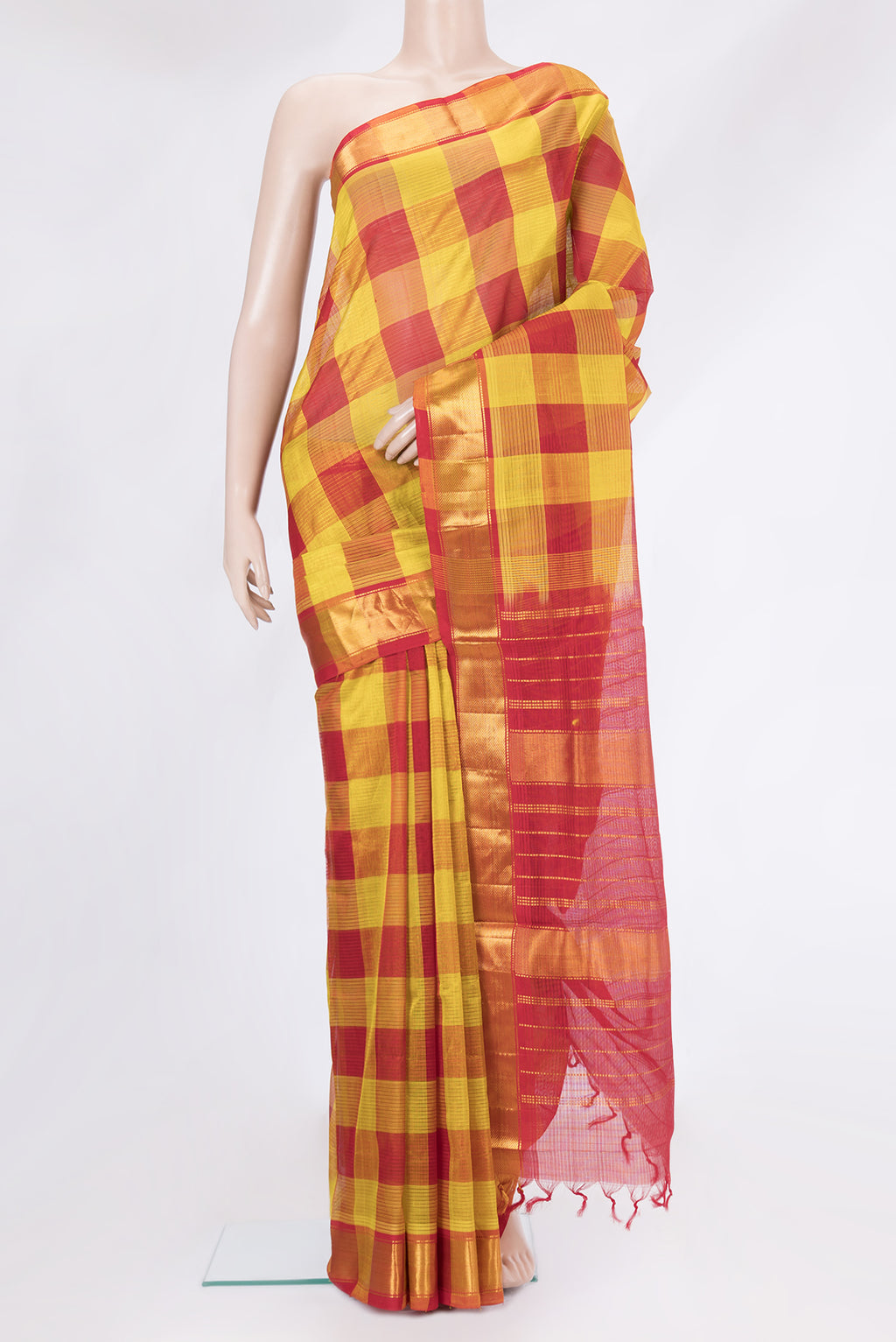 Multi Color Silk Cotton Saree with Checked design on the body and Zari Border.  displayed on a mannequin