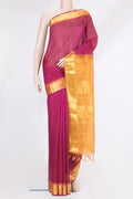 Magenta Silk Cotton Saree with Checked design on the body and Zari Border.  displayed on a mannequin