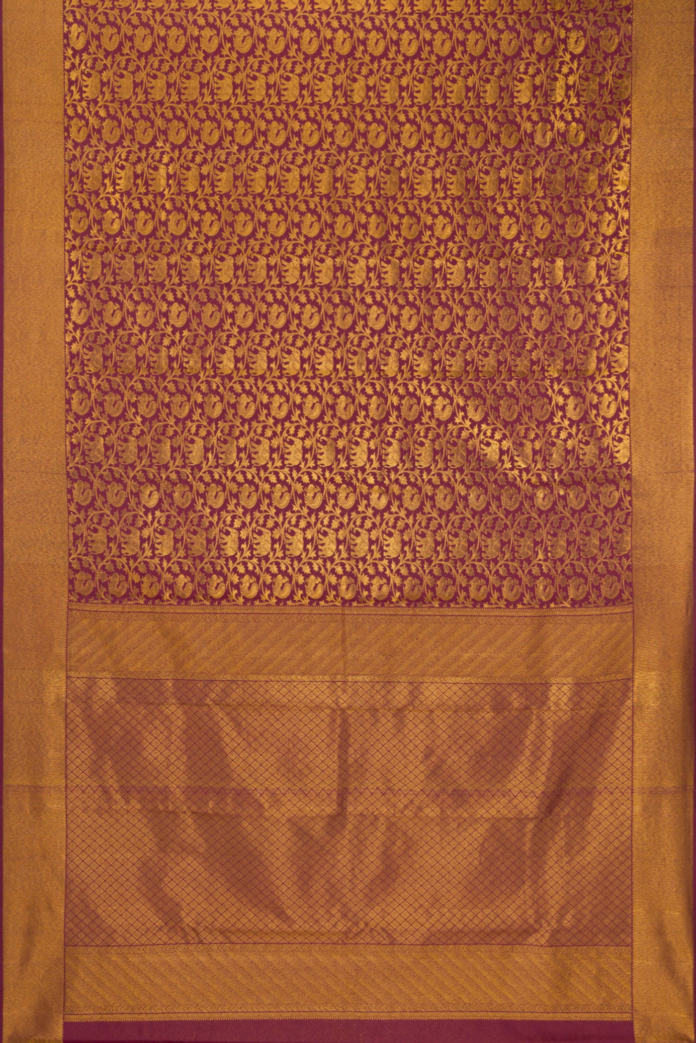 Flat view of Maroon Kanchipuram Silk Saree with Zari Brocade on the body and Zari Border. 