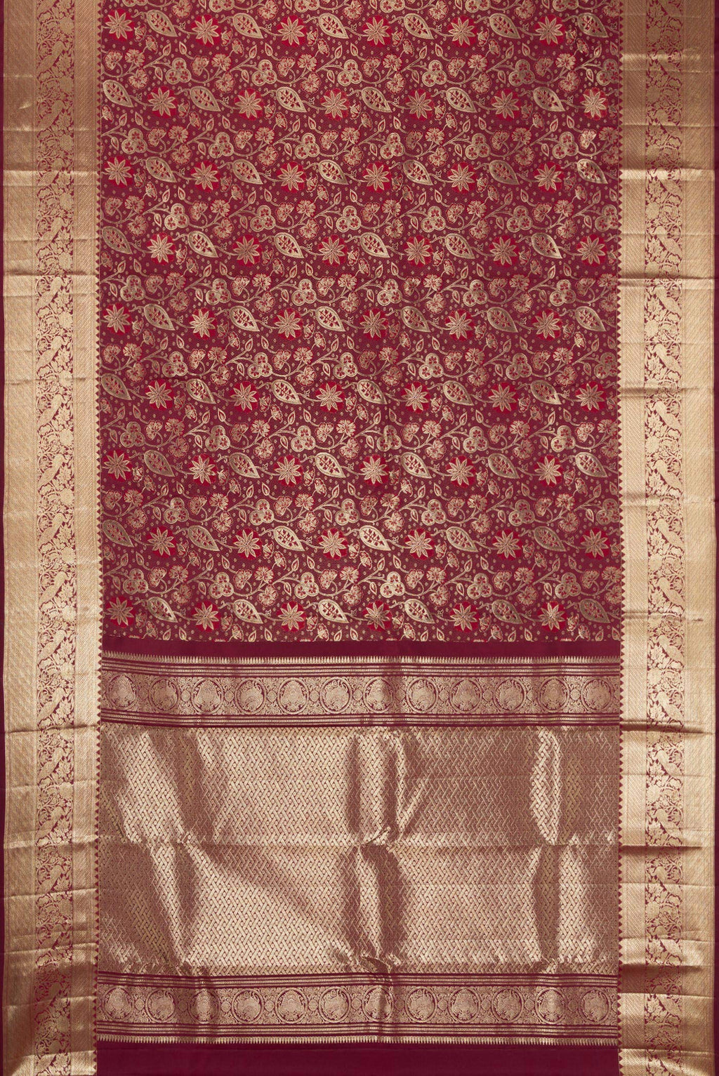 Flat view of Maroon Kanchipuram Silk Saree with Zari Brocade on the body and Fancy Border. 