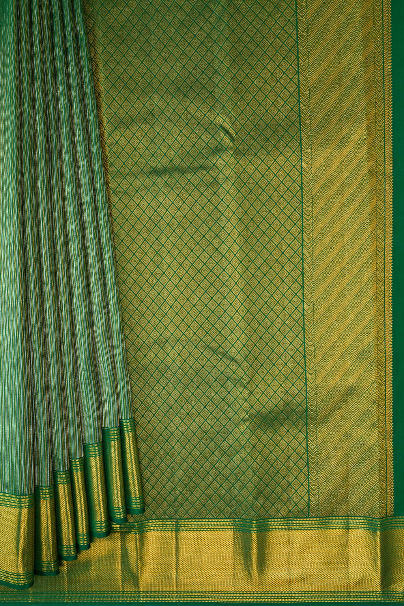 Pleats and pallu of Bottle Green Kanchipuram Silk Saree with Zari Brocade on the body and Zari Border. 