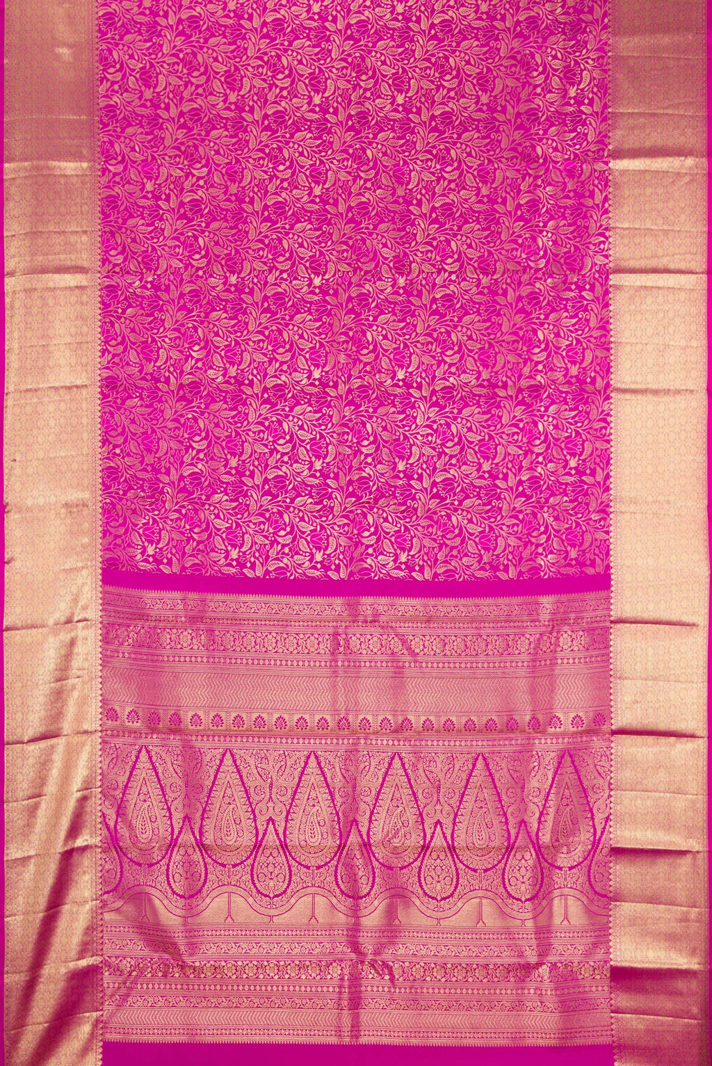 Flat view of Magenta Kanchipuram Silk Saree with Zari Brocade on the body and Zari Border. 