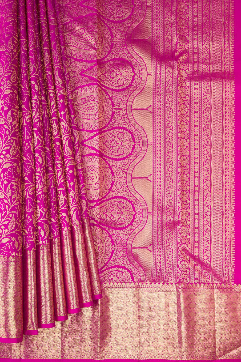 Pleats and pallu of Magenta Kanchipuram Silk Saree with Zari Brocade on the body and Zari Border. 
