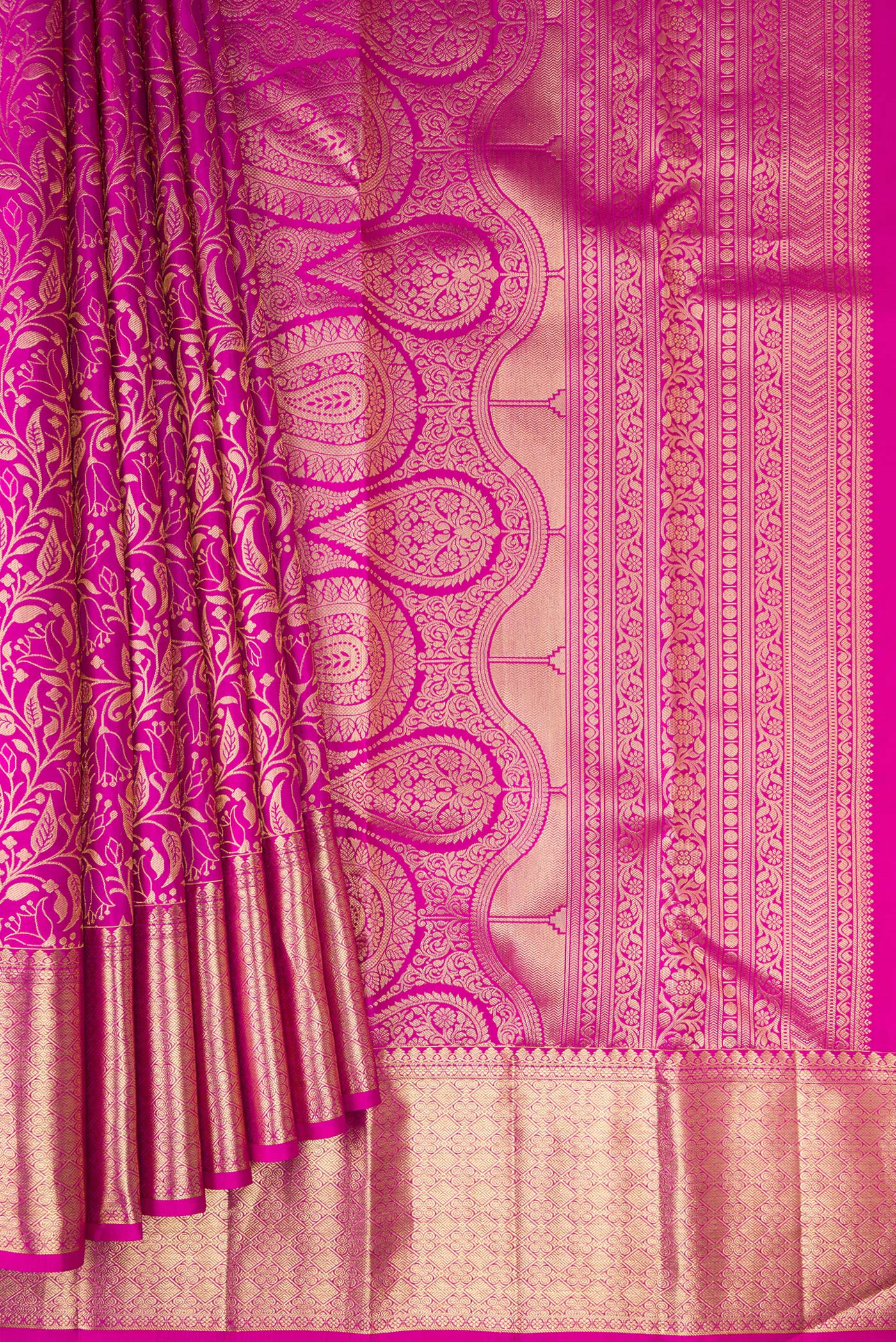 Pleats and pallu of Magenta Kanchipuram Silk Saree with Zari Brocade on the body and Zari Border. 
