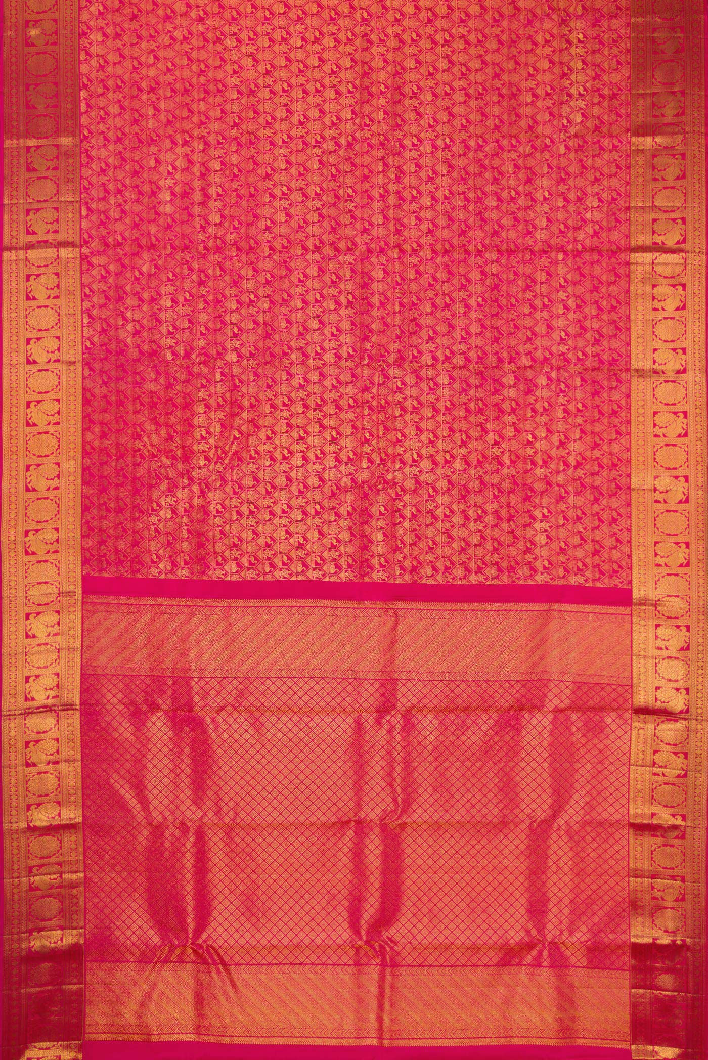 Flat view of Dark Pink Kanchipuram Silk Saree with Zari Brocade on the body and Zari Border. 