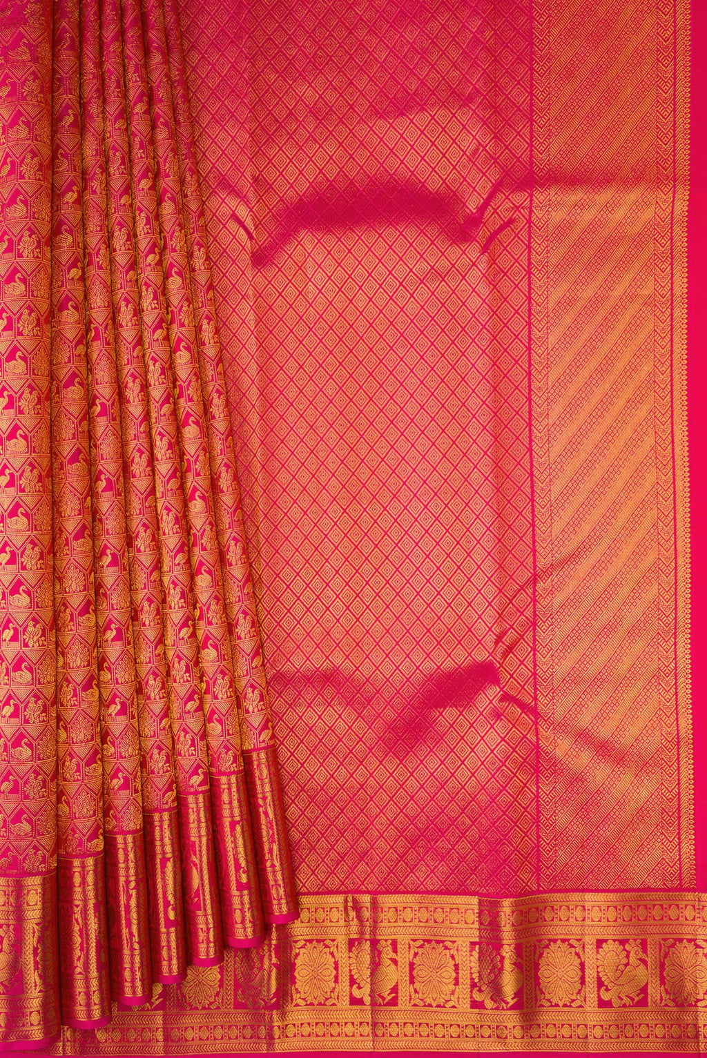 Pleats and pallu of Dark Pink Kanchipuram Silk Saree with Zari Brocade on the body and Zari Border. 