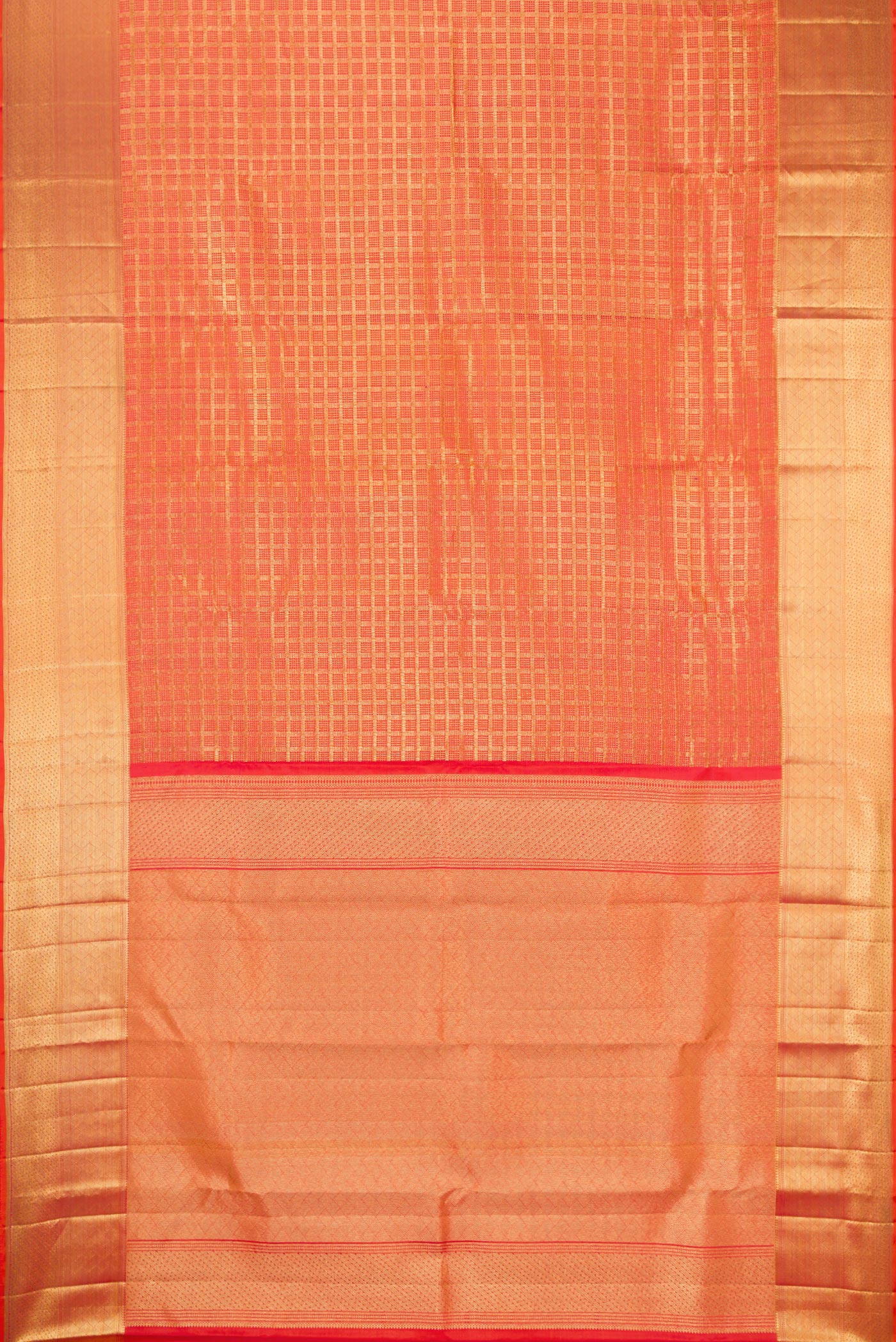 Flat view of Orange Kanchipuram Silk Saree with Zari Brocade on the body and Zari Border. 