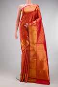 Red Kanchipuram Silk Saree with Zari Brocade on the body and Zari Border.  displayed on a mannequin