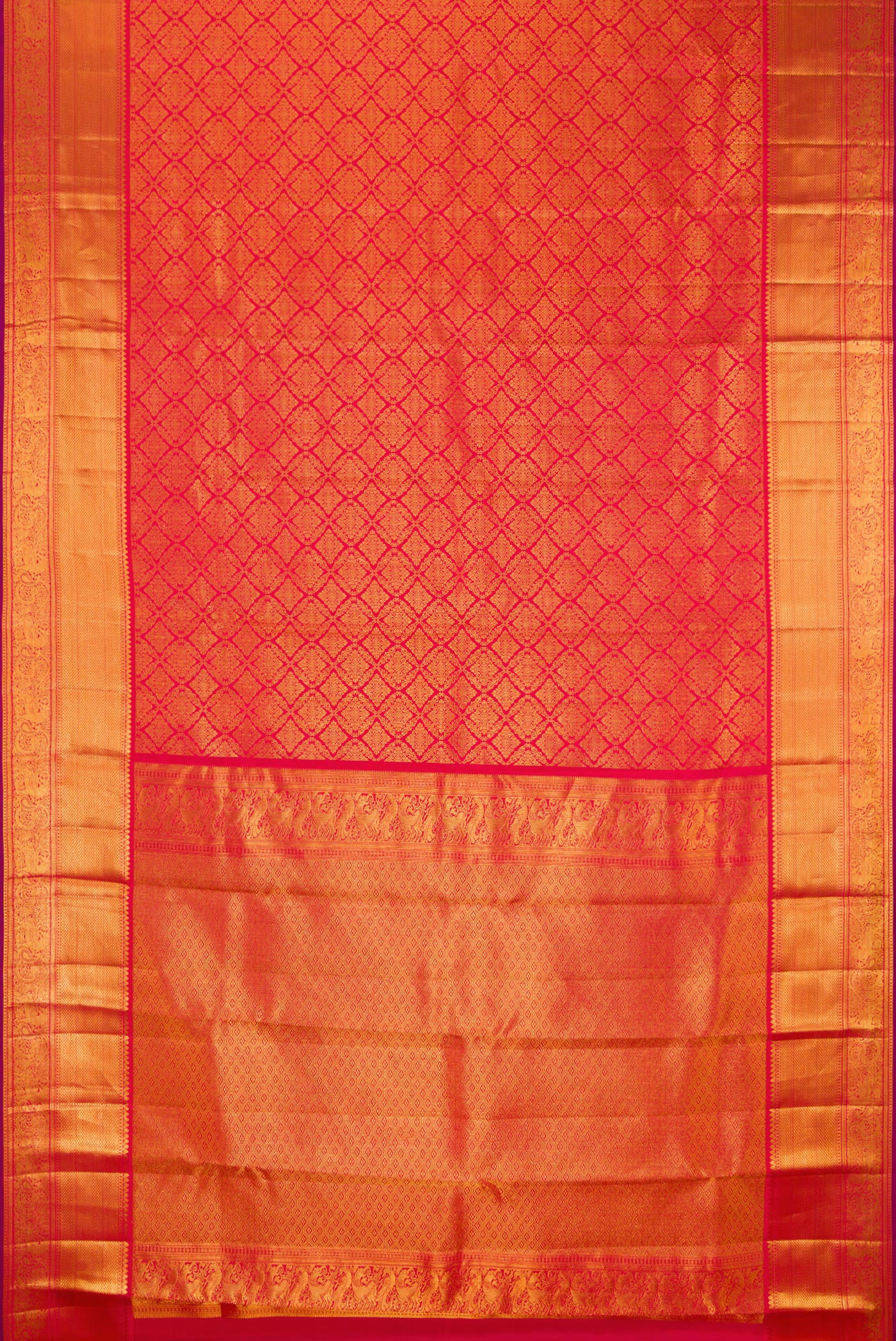 Flat view of Red Kanchipuram Silk Saree with Zari Brocade on the body and Zari Border. 