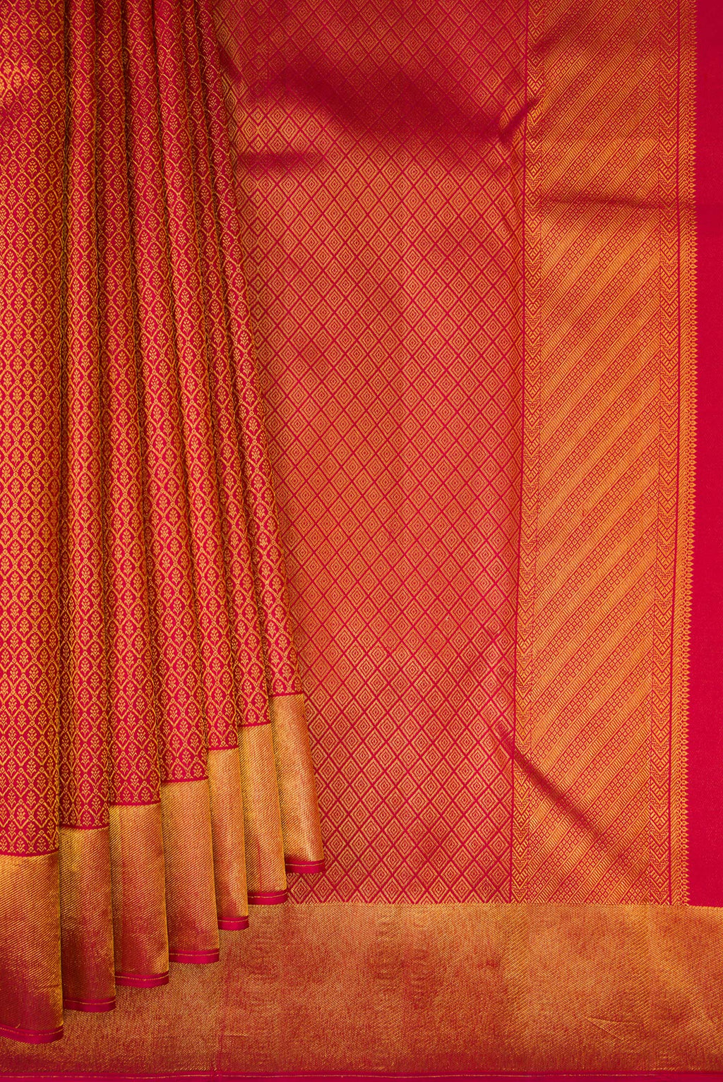 Pleats and pallu of Maroon Kanchipuram Silk Saree with Zari Brocade on the body and Zari Border. 