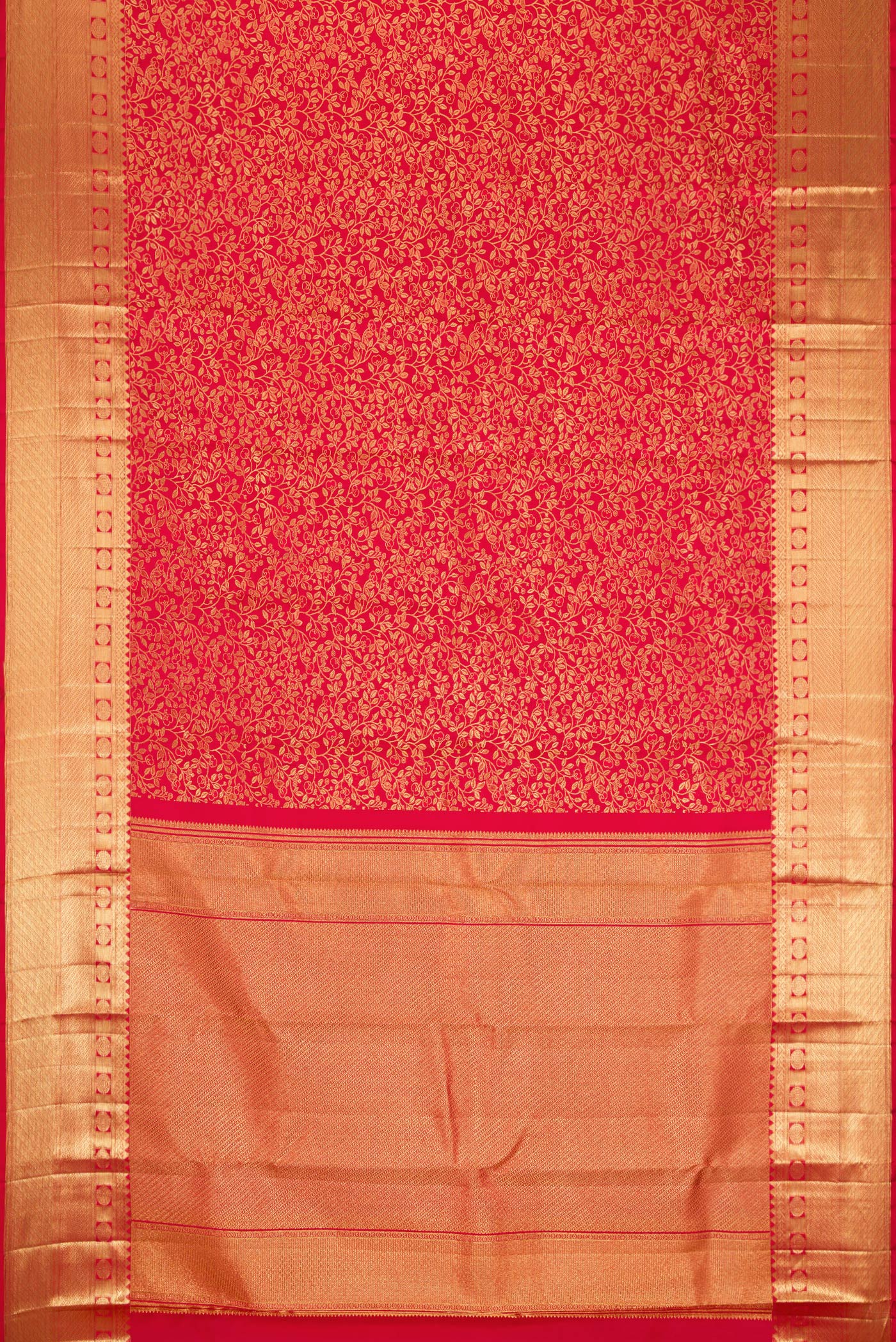 Flat view of Red Kanchipuram Silk Saree with Zari Brocade on the body and Zari Border. 
