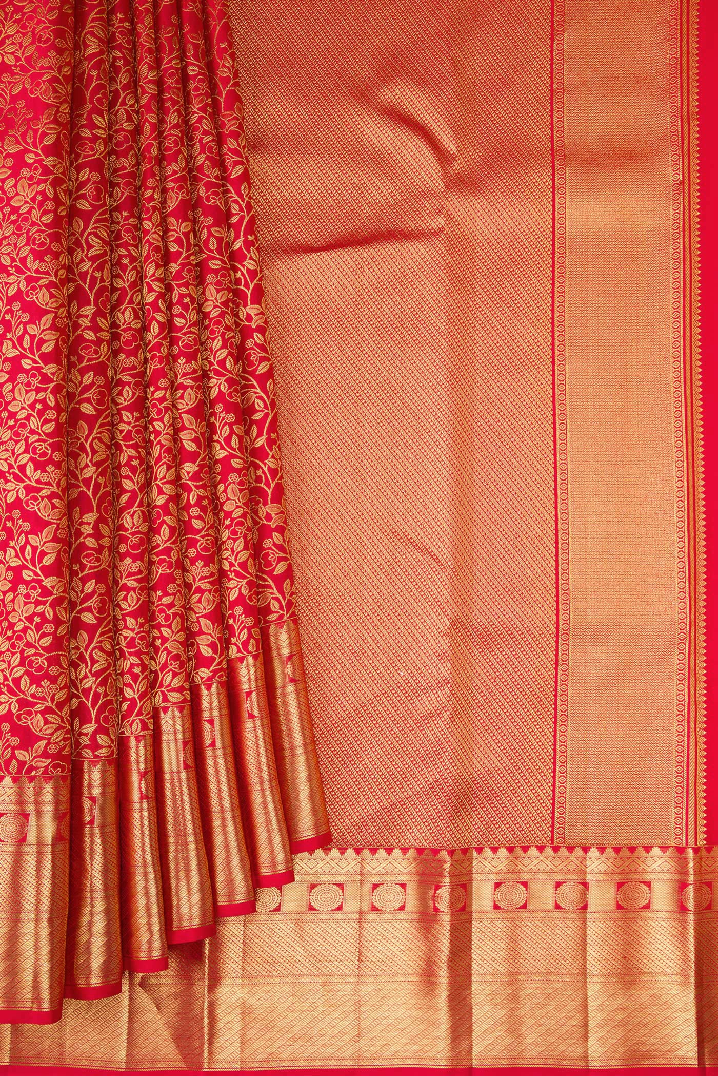 Pleats and pallu of Red Kanchipuram Silk Saree with Zari Brocade on the body and Zari Border. 
