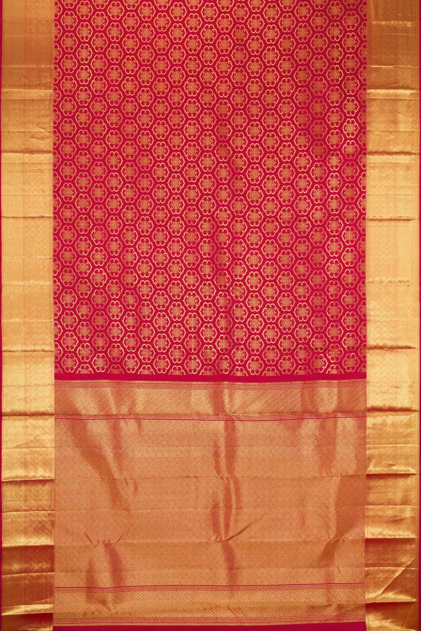 Flat view of Maroon Kanchipuram Silk Saree with Zari Brocade on the body and Zari Border. 