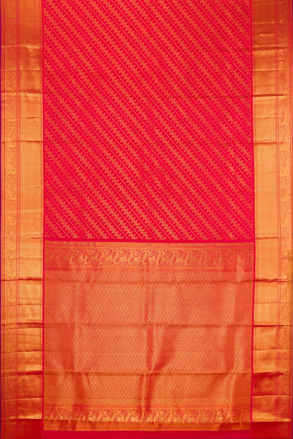 Flat view of Red Kanchipuram Silk Saree with Zari Brocade on the body and Zari Border. 