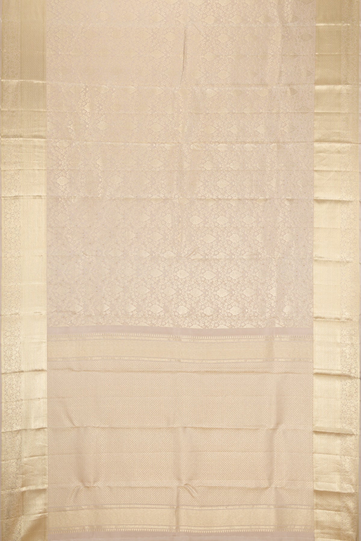 Flat view of Off White Kanchipuram Silk Saree with Zari Brocade on the body and Zari Border. 