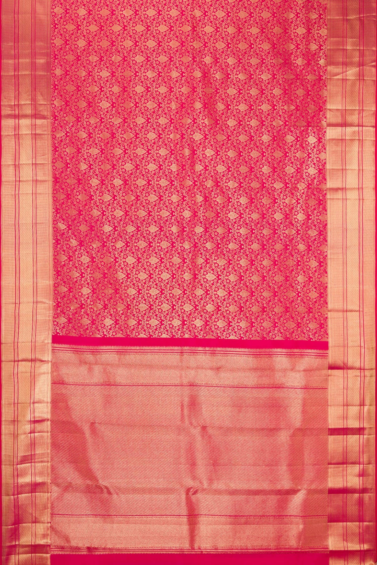 Flat view of Dark Pink Kanchipuram Silk Saree with Zari Brocade on the body and Zari Border. 