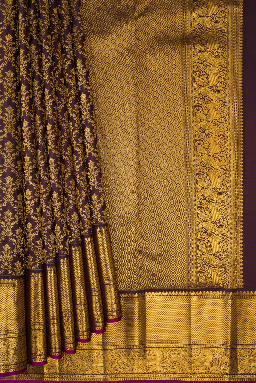 Pleats and pallu of Coffee Brown Kanchipuram Silk Saree with Zari Brocade on the body and Zari Border. 