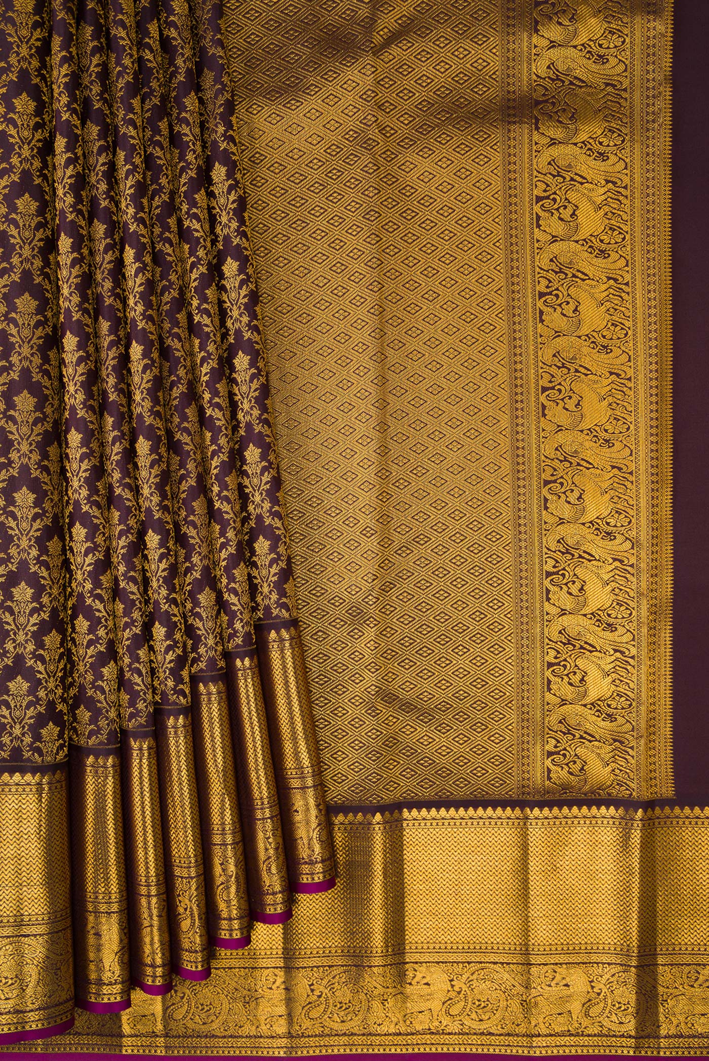 Pleats and pallu of Coffee Brown Kanchipuram Silk Saree with Zari Brocade on the body and Zari Border. 