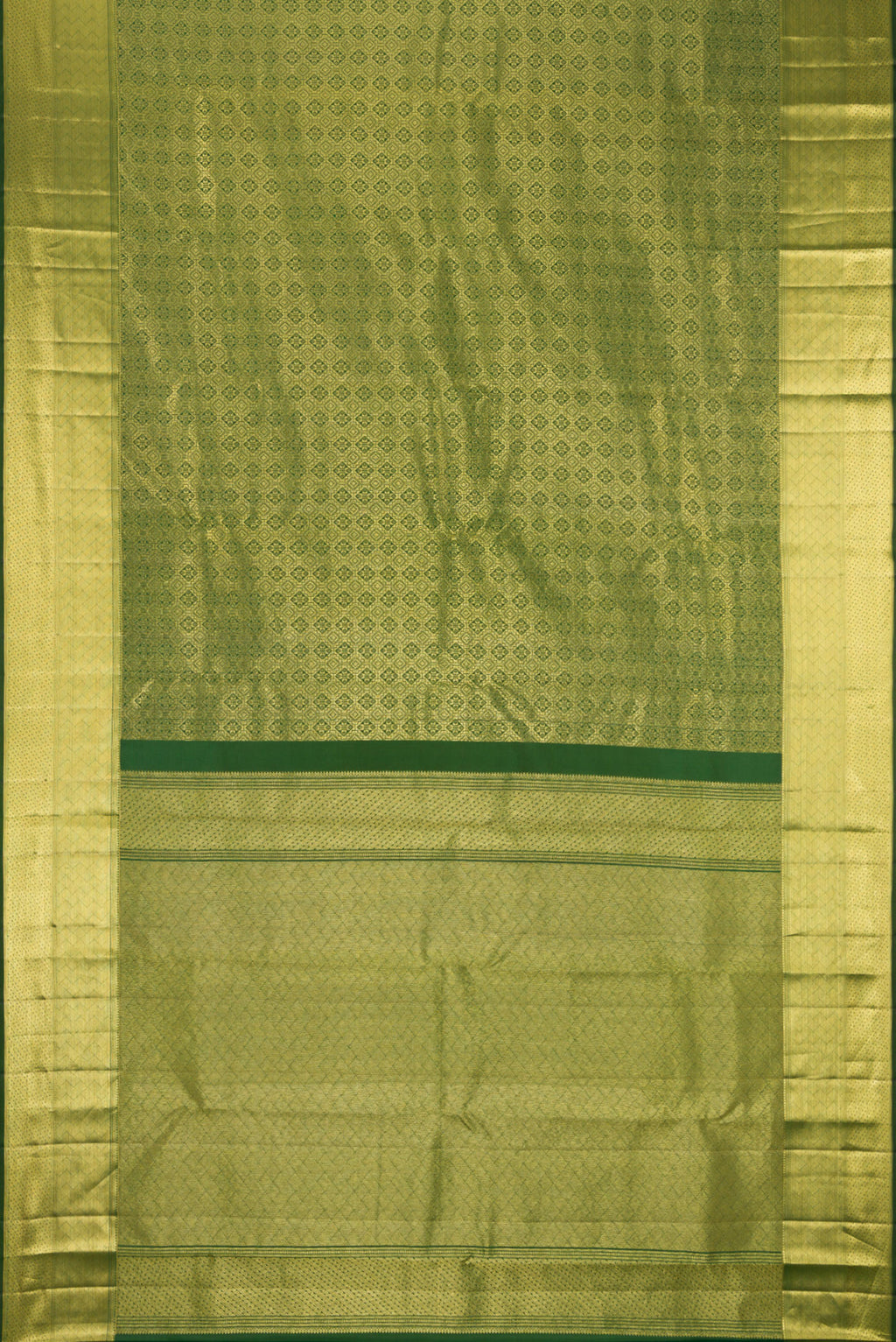 Flat view of Bottle Green Kanchipuram Silk Saree with Zari Brocade on the body and Zari Border. 