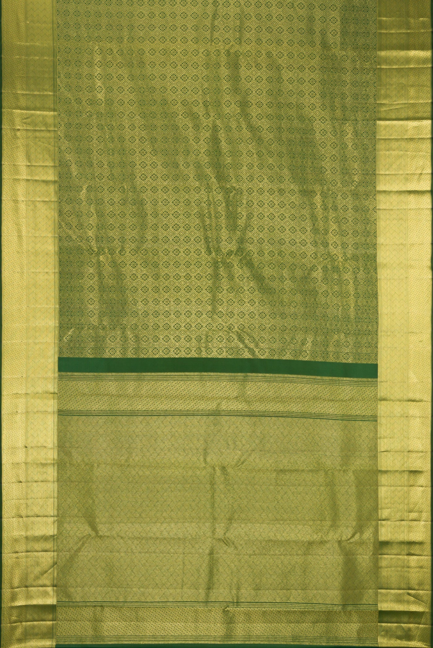Flat view of Bottle Green Kanchipuram Silk Saree with Zari Brocade on the body and Zari Border. 