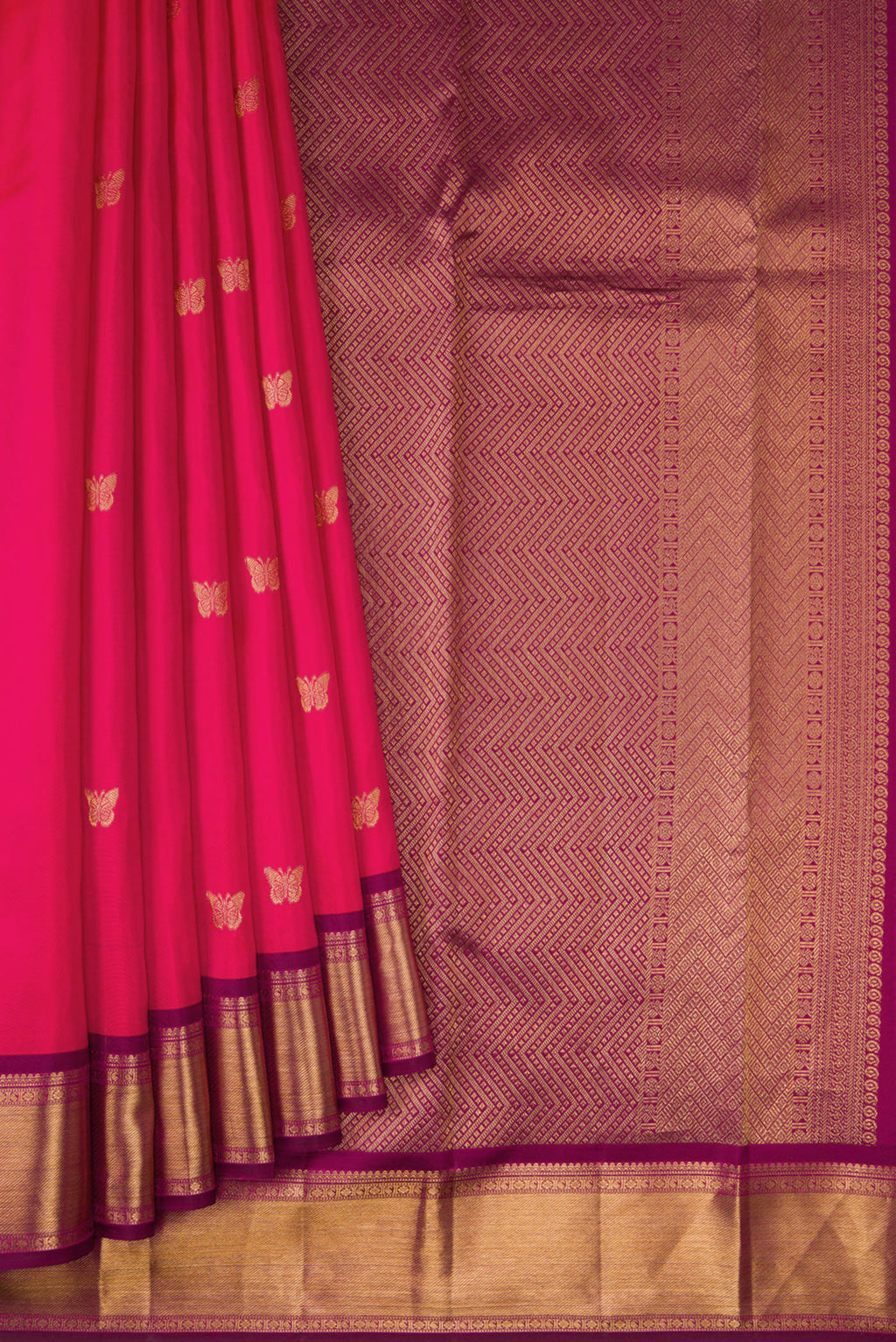 Pleats and pallu of Dark Pink Kanjivaram Silk Saree with Zari Butta on the body and Zari Border. 