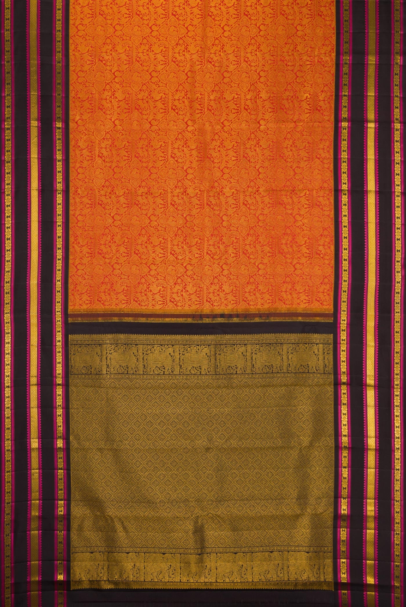 Flat view of Brick Orange Dual Tone Kanchipuram Silk Saree with Zari Brocade on the body and Zari And Thread Border. 