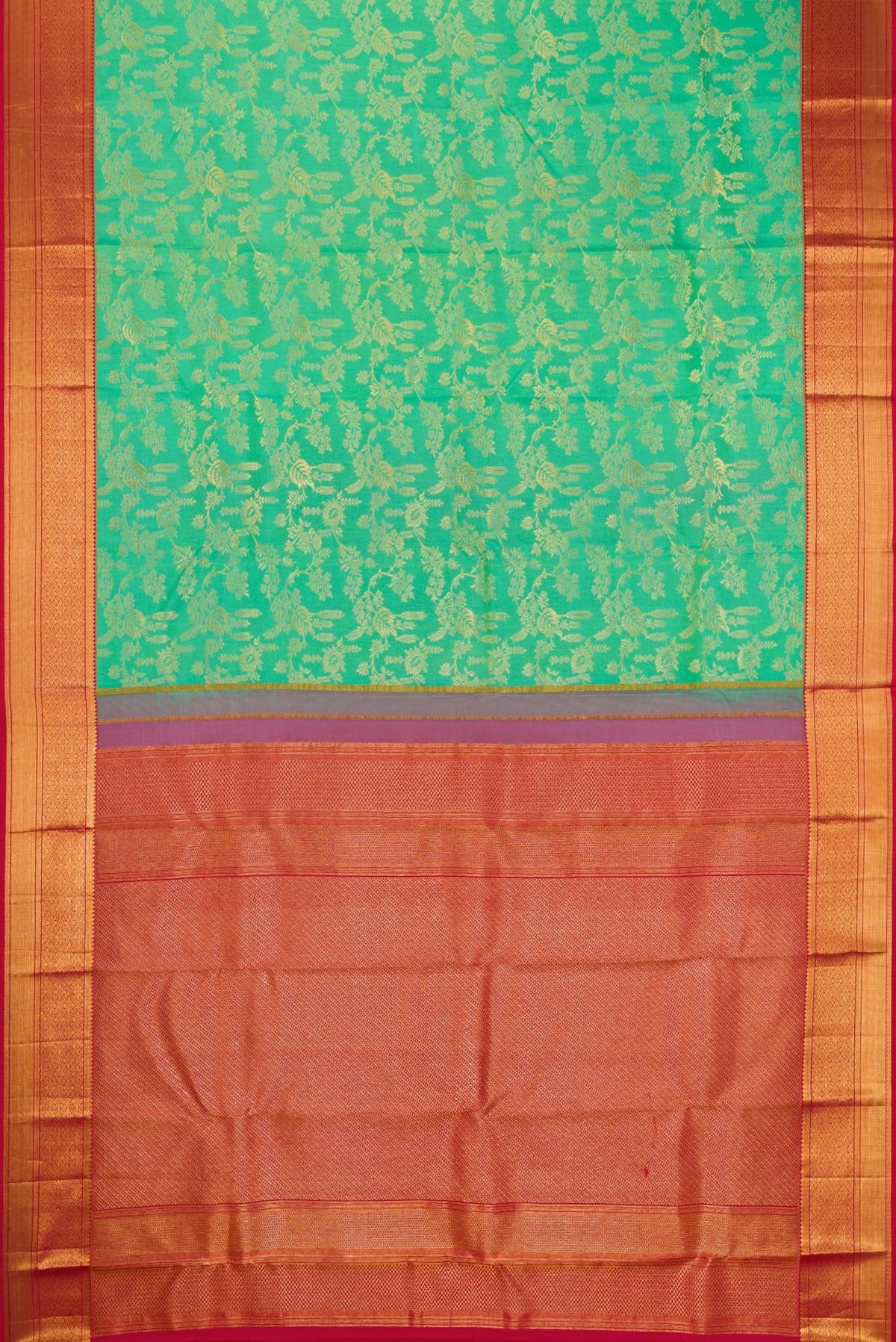 Flat view of Green Kanchipuram Silk Saree with Zari Brocade on the body and Zari Border. 