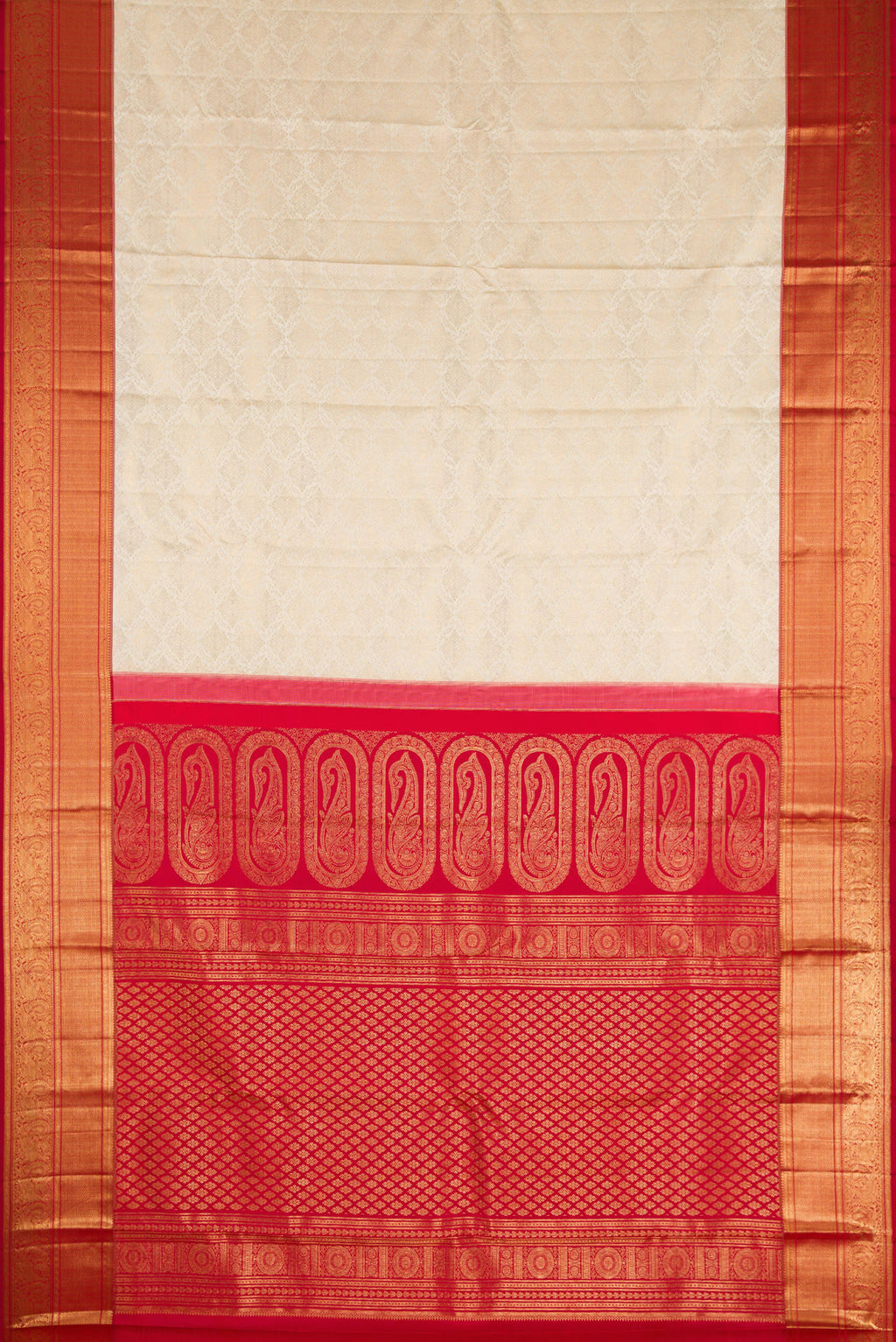 Flat view of Off White Kanchipuram Silk Saree with Zari Brocade on the body and Zari Border. 