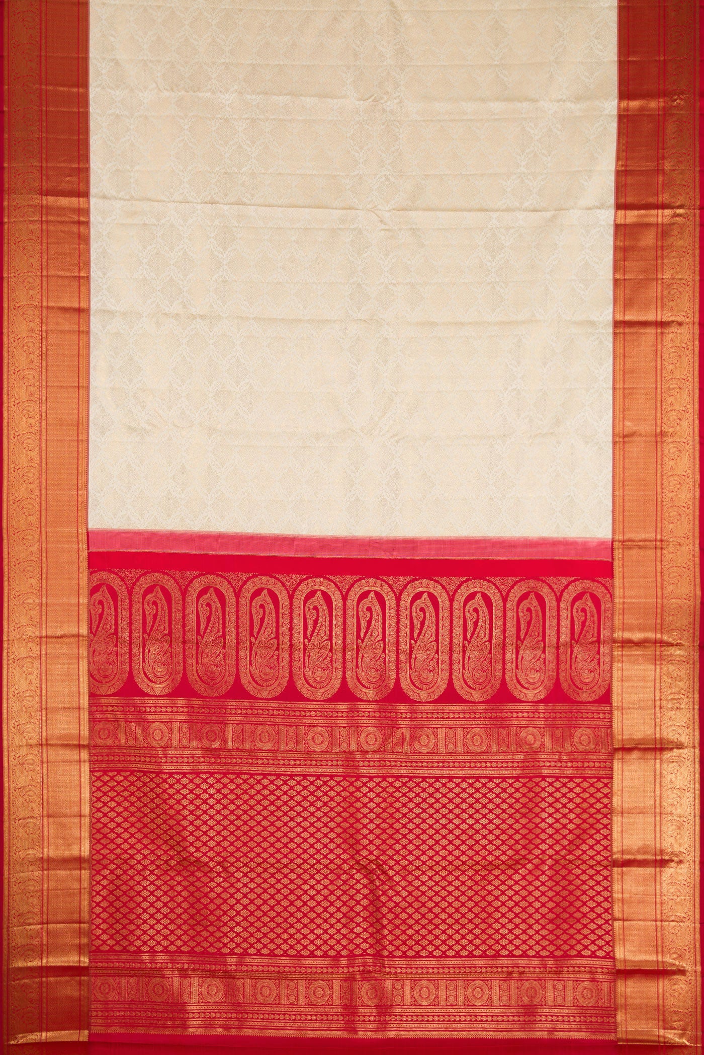 Flat view of Off White Kanchipuram Silk Saree with Zari Brocade on the body and Zari Border. 