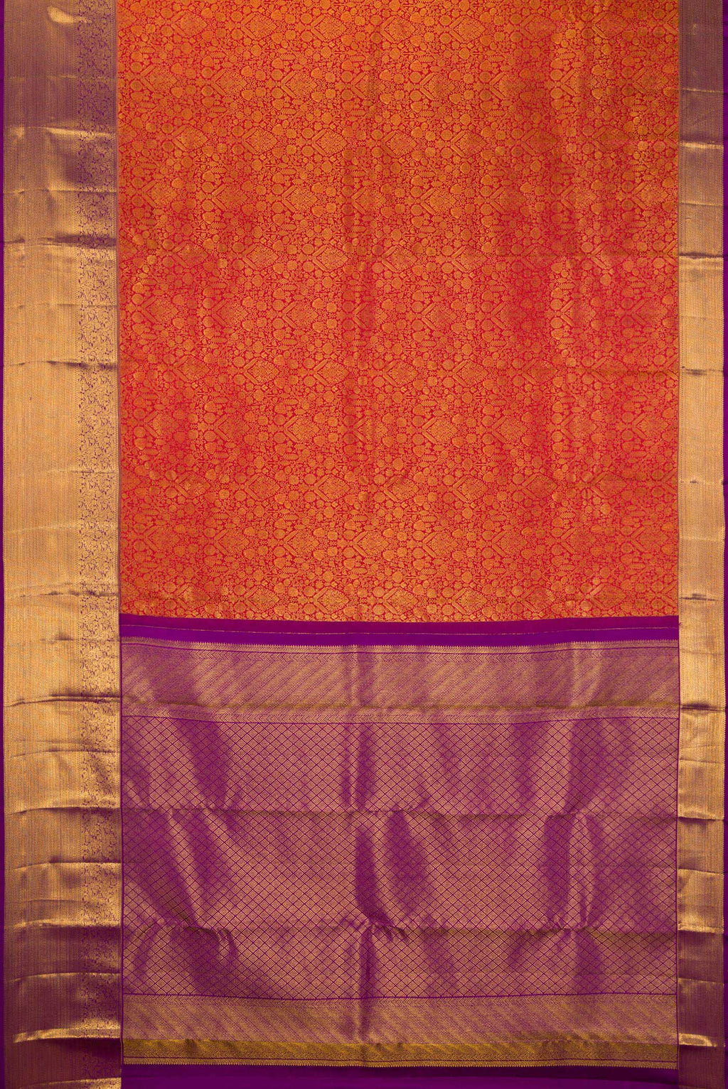 Flat view of Brick Orange Kanchipuram Silk Saree with Zari Brocade on the body and Zari Border. 