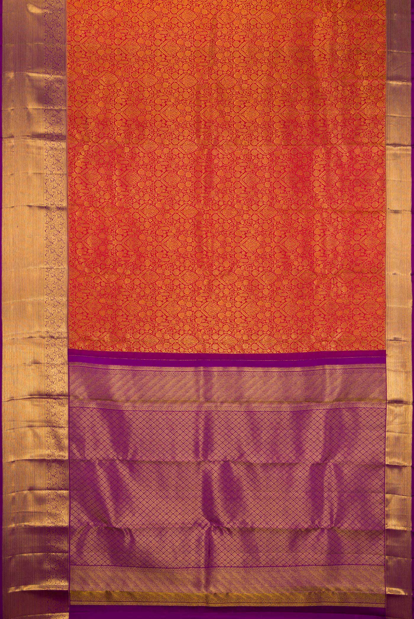 Flat view of Brick Orange Kanchipuram Silk Saree with Zari Brocade on the body and Zari Border. 