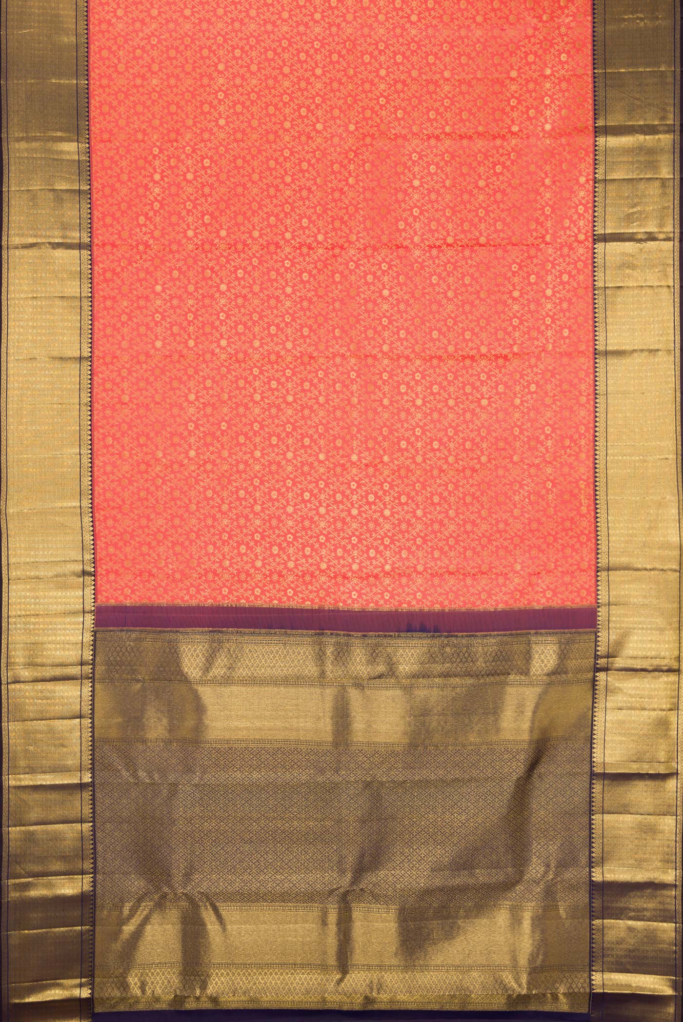 Flat view of Coral Kanchipuram Silk Saree with Zari Brocade on the body and Zari Border. 