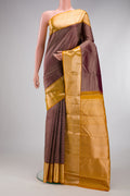 Coffee Brown Kanchipuram Silk Saree with Zari Brocade on the body and Zari Border.  displayed on a mannequin