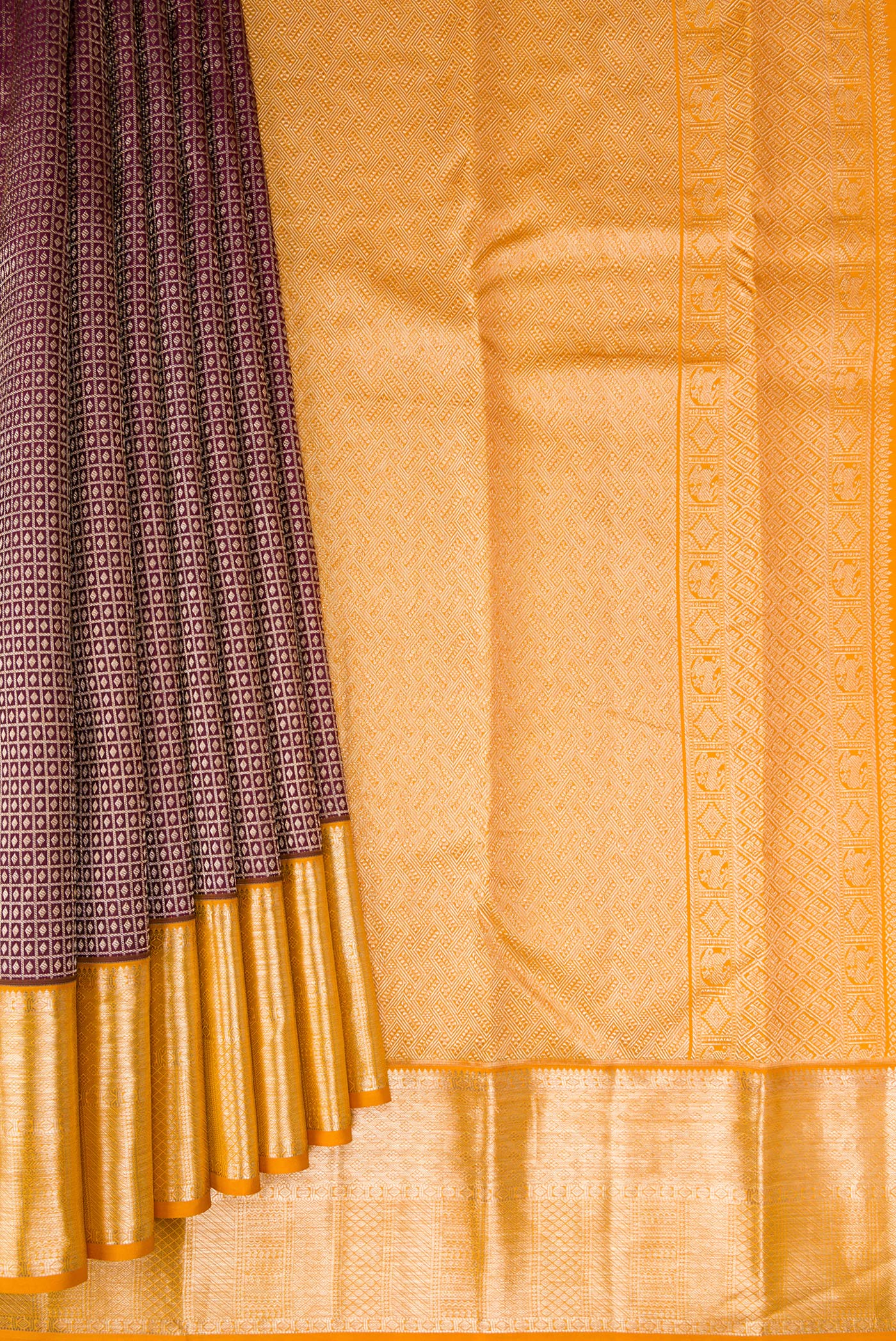 Pleats and pallu of Coffee Brown Kanchipuram Silk Saree with Zari Brocade on the body and Zari Border. 