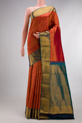 Pure Silk Red Kanchipuram Saree with Zari Brocade on the body and Zari Border.  displayed on a mannequin