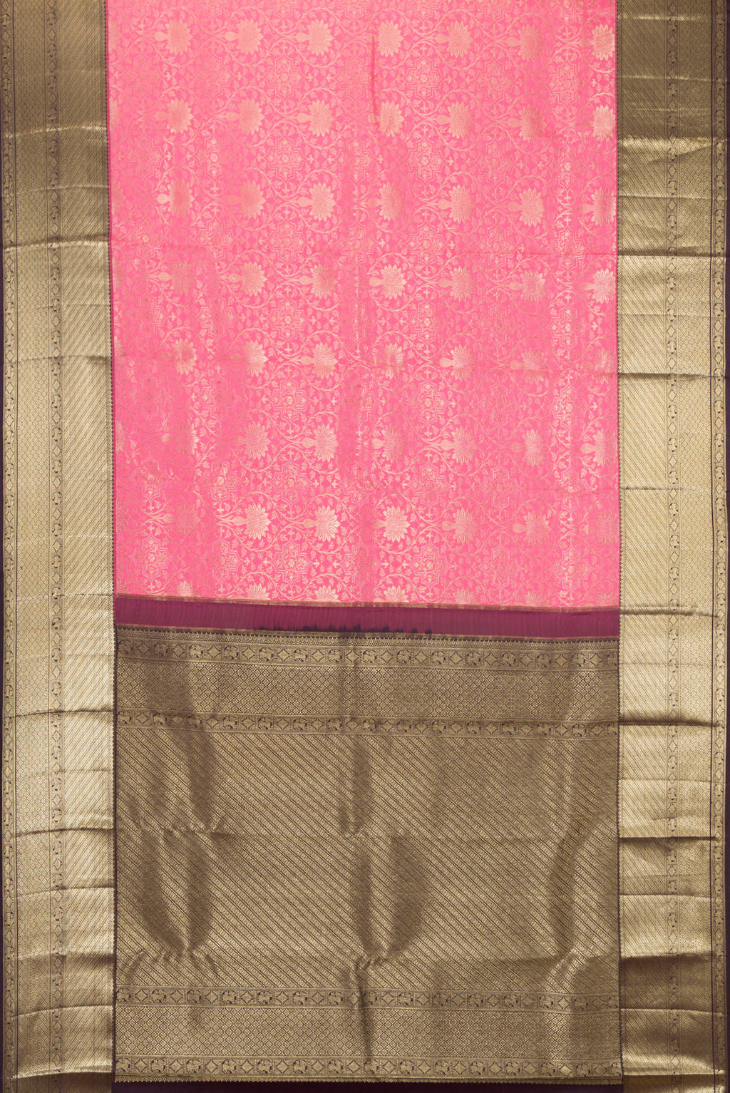 Flat view of Pink Kanchipuram Silk Saree with Zari Brocade on the body and Zari Border. 