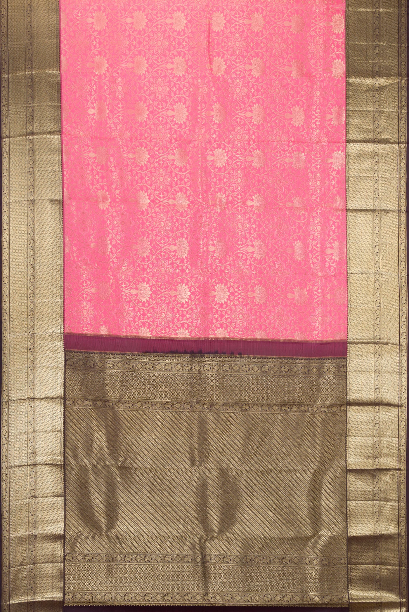 Flat view of Pink Kanchipuram Silk Saree with Zari Brocade on the body and Zari Border. 