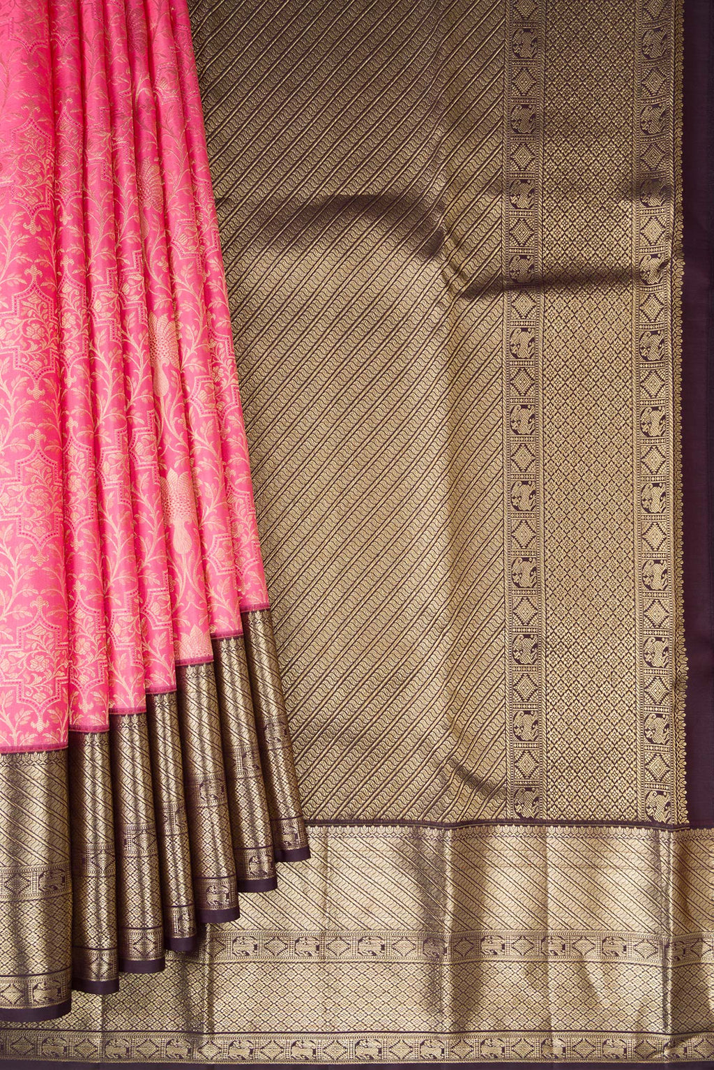 Pleats and pallu of Pink Kanchipuram Silk Saree with Zari Brocade on the body and Zari Border. 
