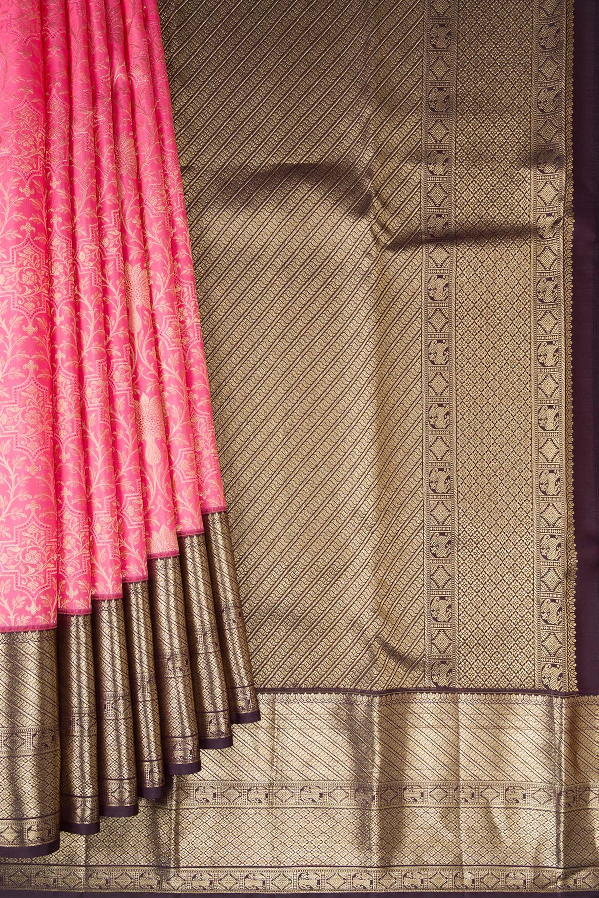 Pleats and pallu of Pink Kanchipuram Silk Saree with Zari Brocade on the body and Zari Border. 
