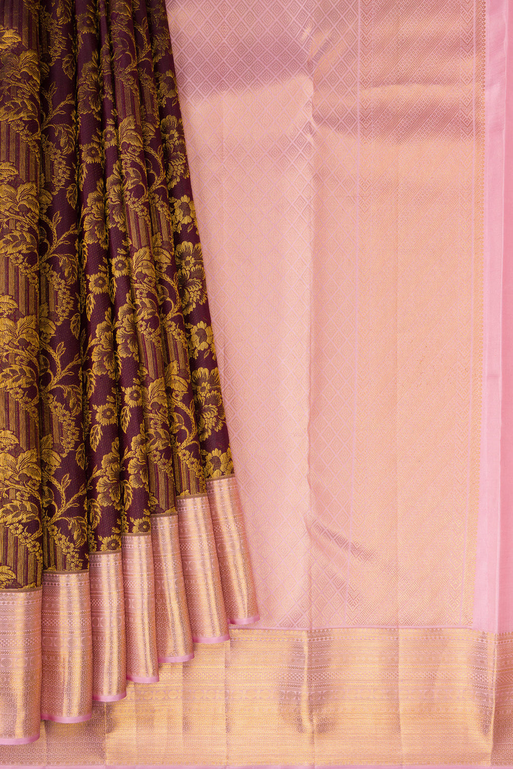 Pleats and pallu of Coffee Brown Kanchipuram Silk Saree with Zari Brocade on the body and Zari Border. 