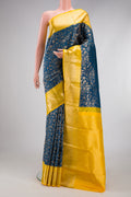 Peacock Blue Kanchipuram Silk Saree with Zari Brocade on the body and Zari Border.  displayed on a mannequin