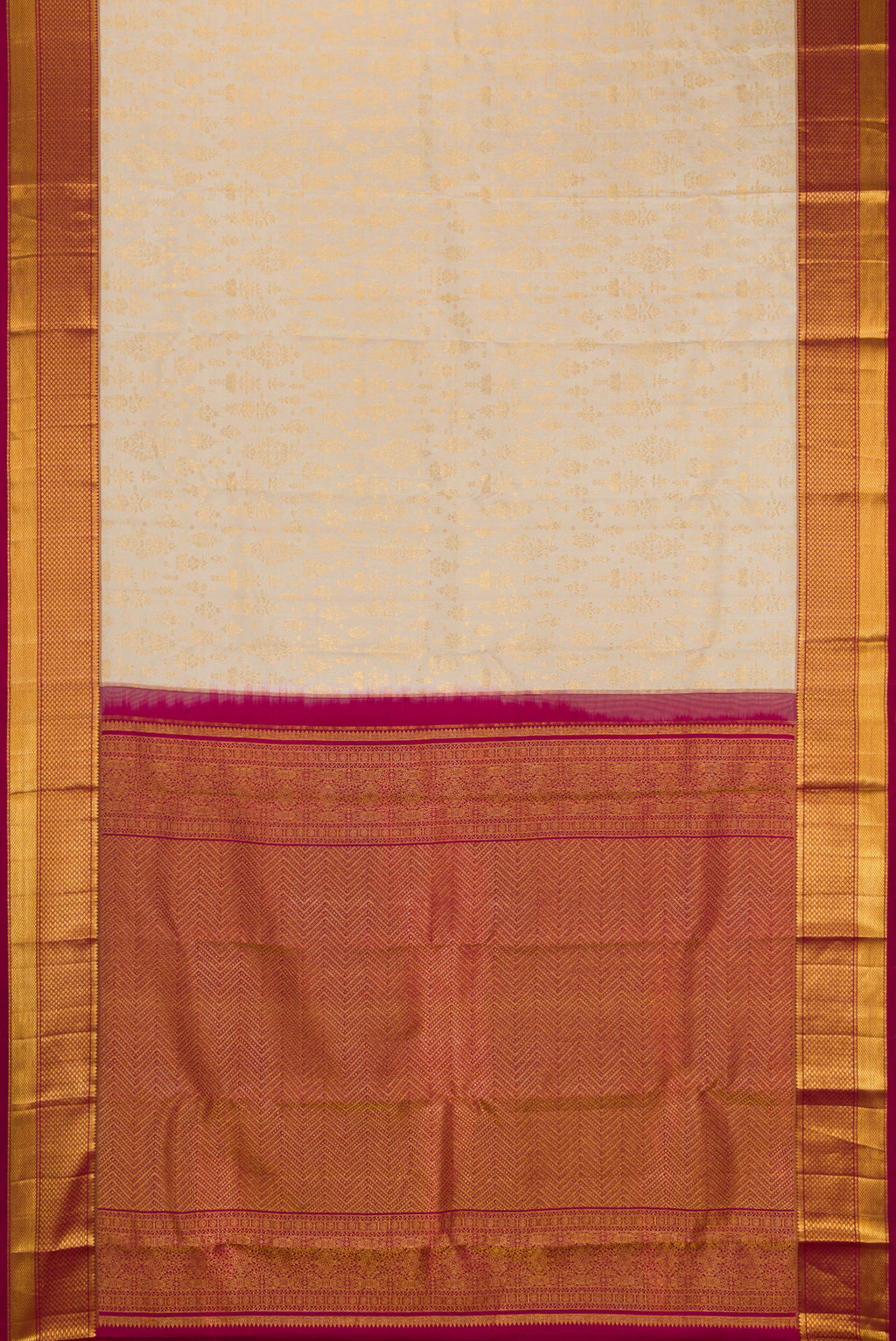 Flat view of Beige Kanchipuram Silk Saree with Zari Brocade on the body and Zari Border. 