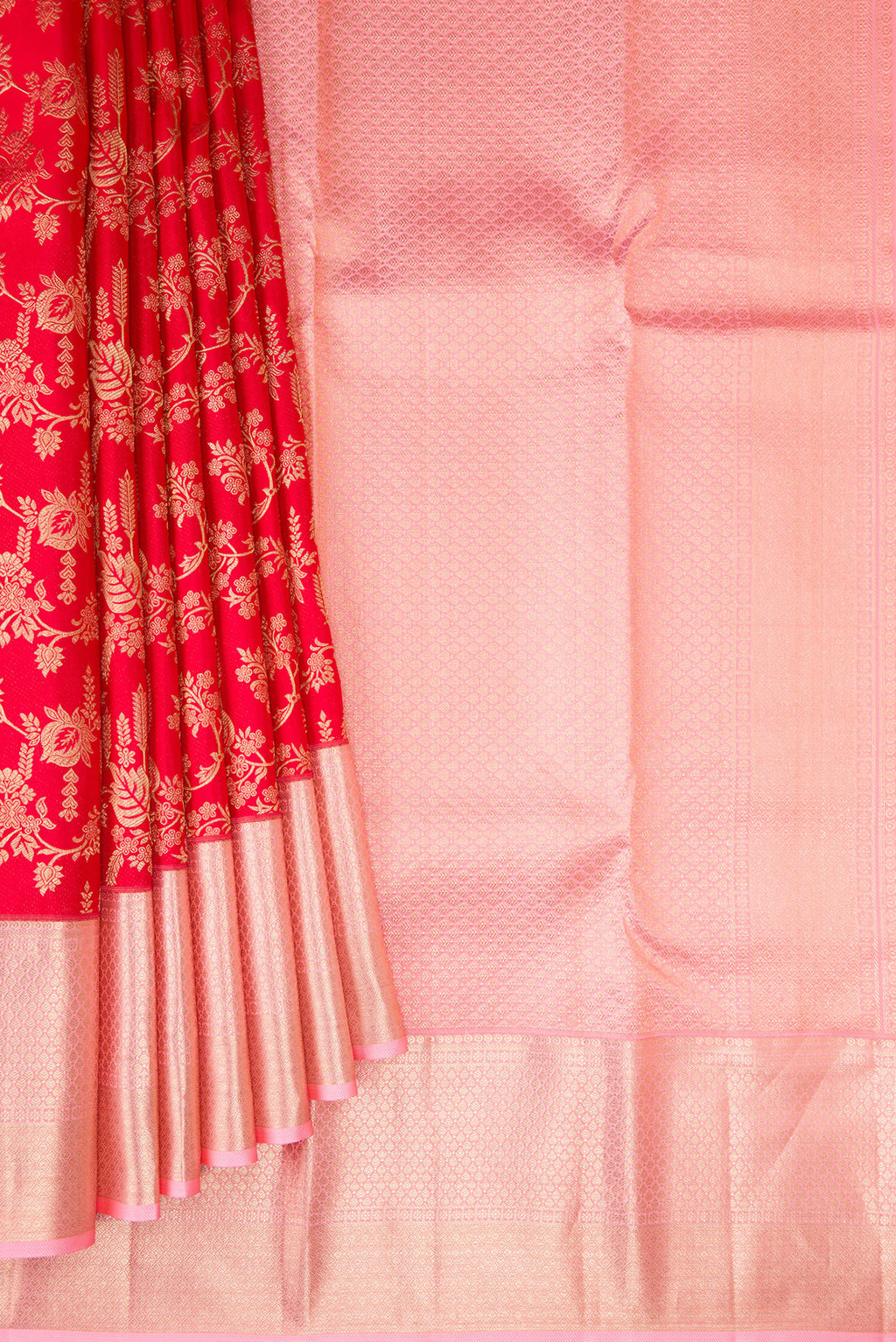 Pleats and pallu of Red Kanchipuram Silk Saree with Zari Brocade on the body and Zari Border. 
