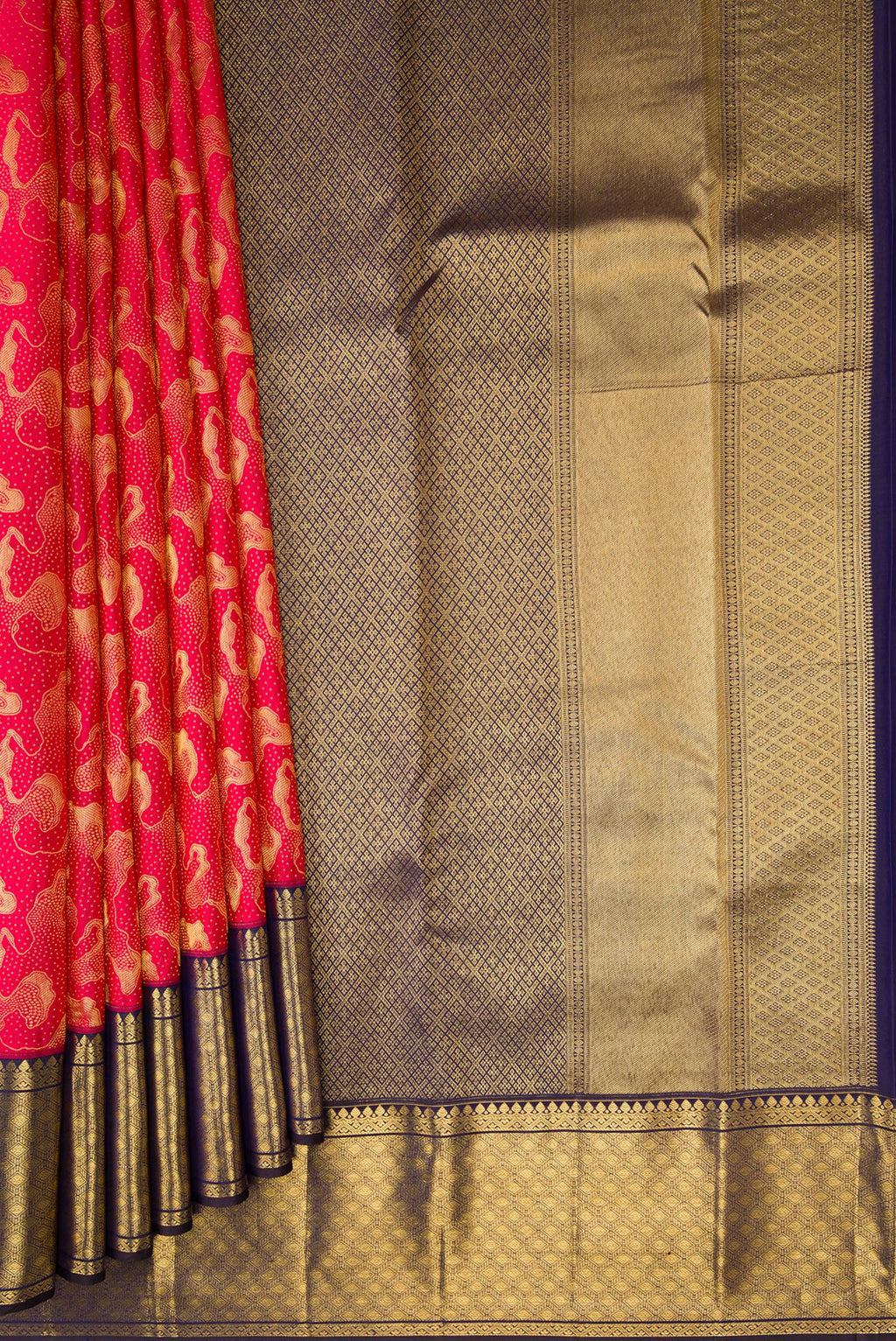 Pleats and pallu of Dark Pink Kanchipuram Silk Saree with Zari Brocade on the body and Zari Border. 