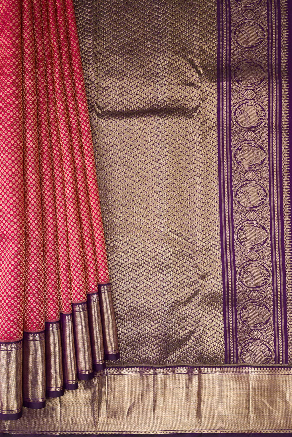 Pleats and pallu of Rani Pink Kanchipuram Silk Saree with Zari Brocade on the body and Zari Border. 