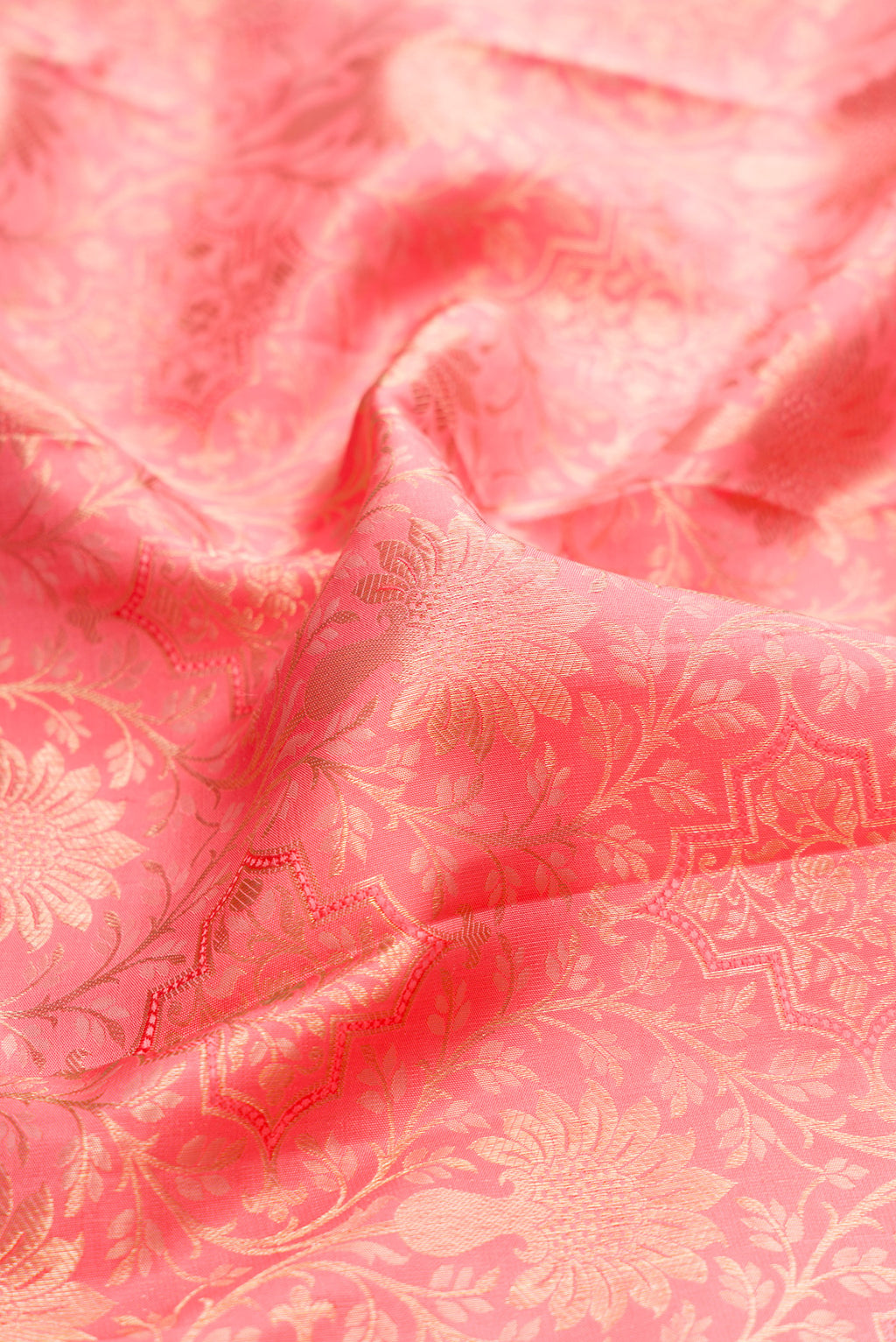 Close up of Pink Dual Tone Kanchipuram Silk Saree with Zari Brocade on the body and Fancy Border.  displaying folds