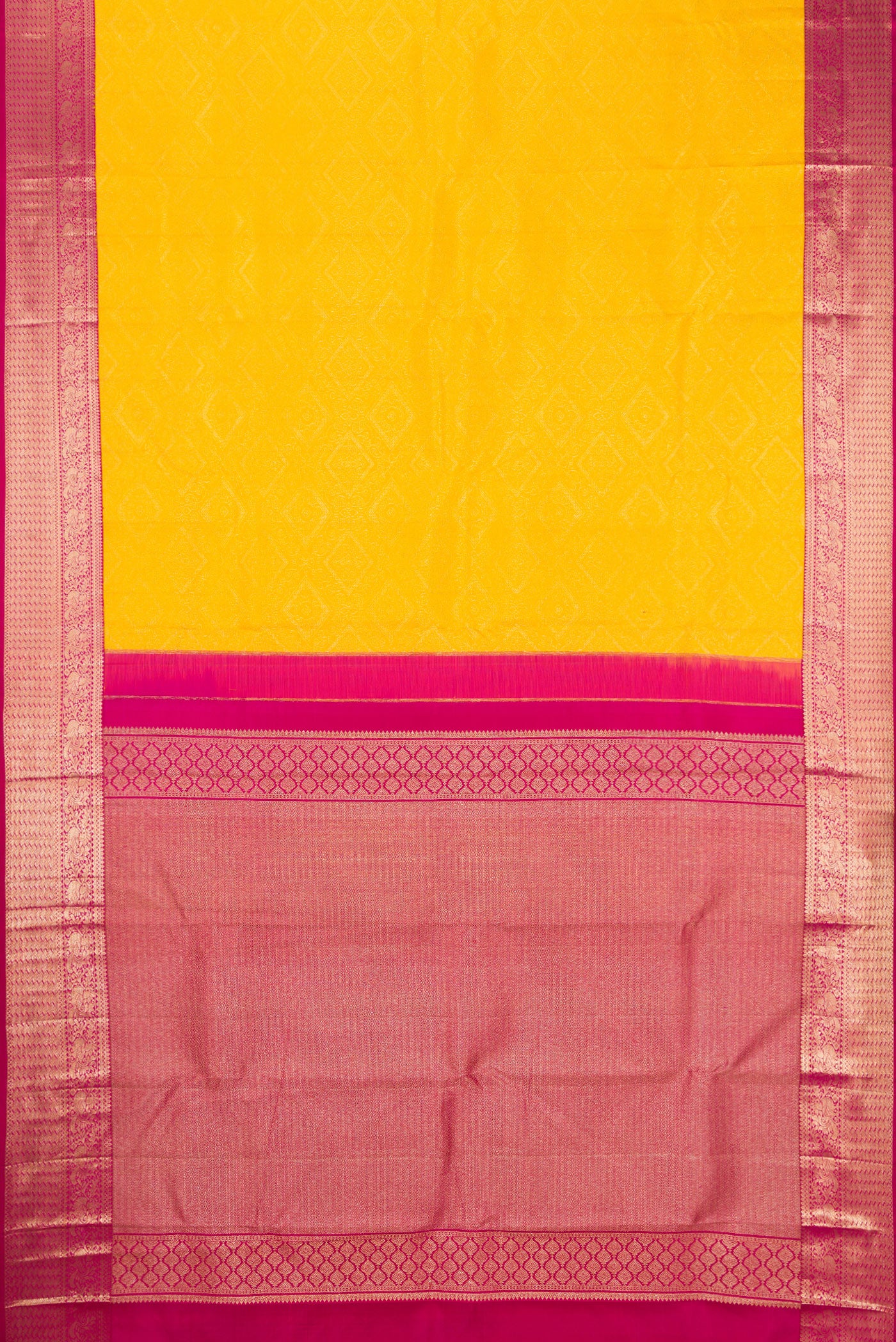 Flat view of Yellow Kanjivaram Silk Saree with Zari Brocade on the body and Zari Border. 