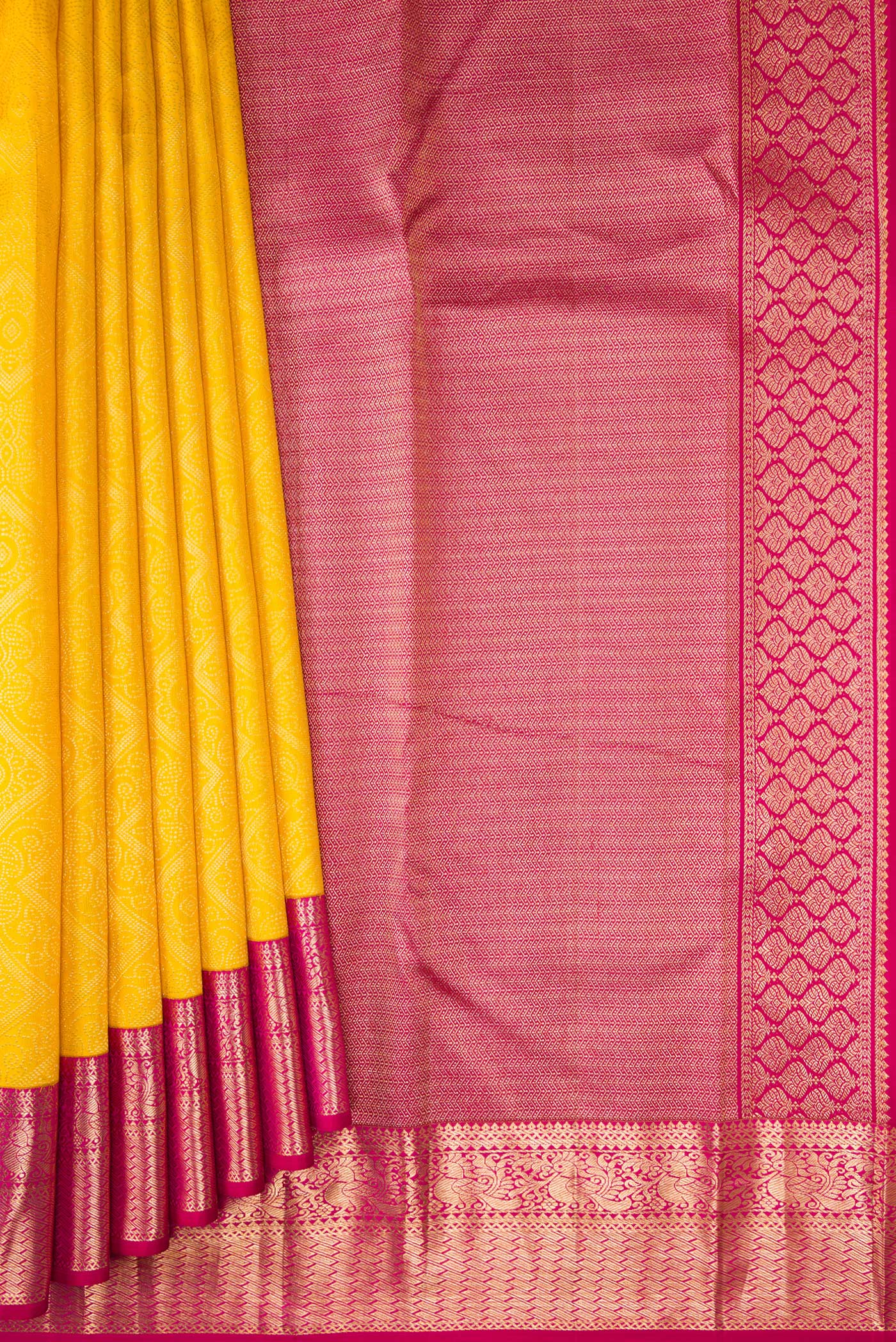 Pleats and pallu of Yellow Kanjivaram Silk Saree with Zari Brocade on the body and Zari Border. 