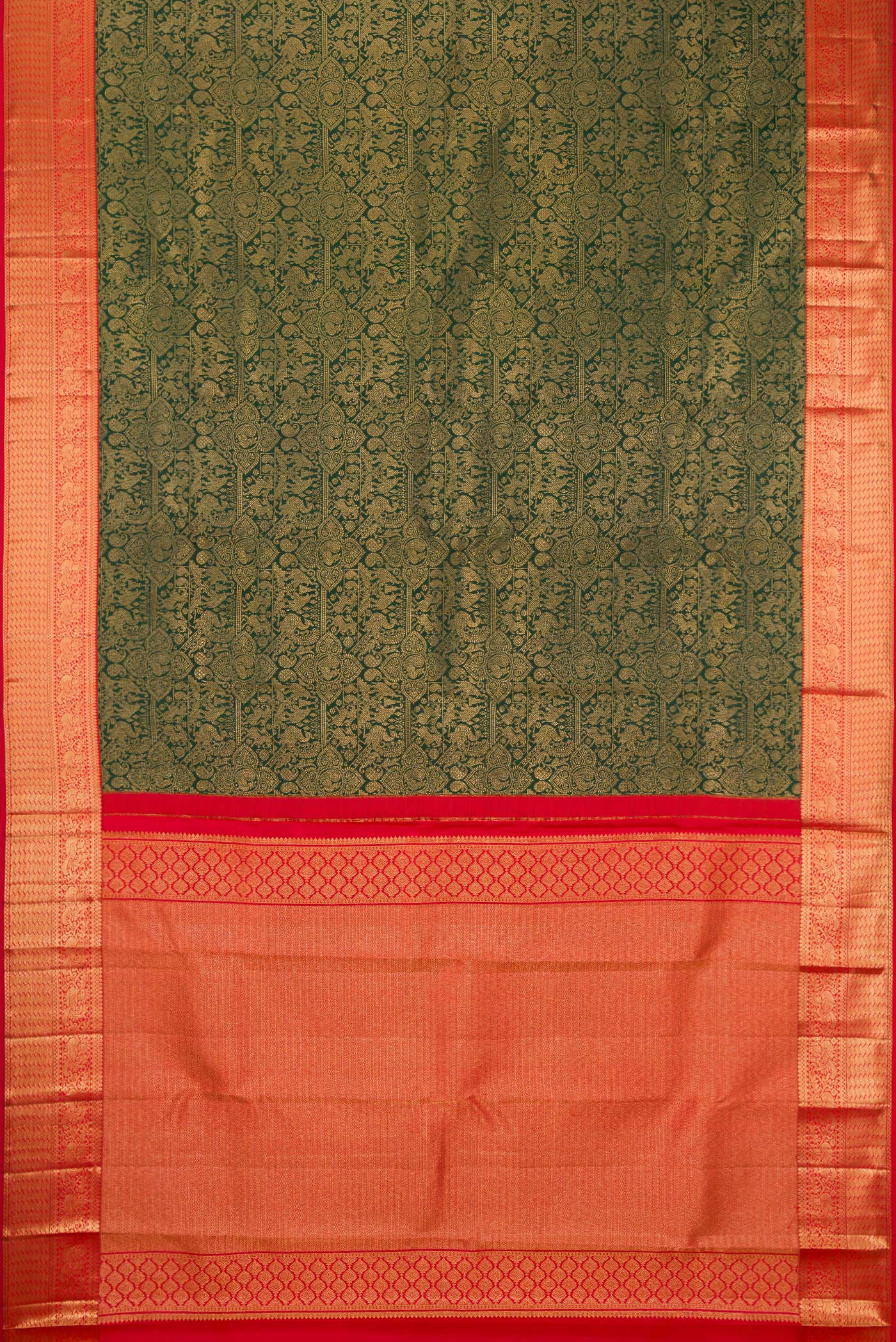 Flat view of Bottle Green Kanjivaram Silk Saree with Zari Brocade on the body and Zari Border. 