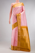 Rose pink Kanjivaram Silk Saree with Zari Brocade on the body and Zari Border.  displayed on a mannequin